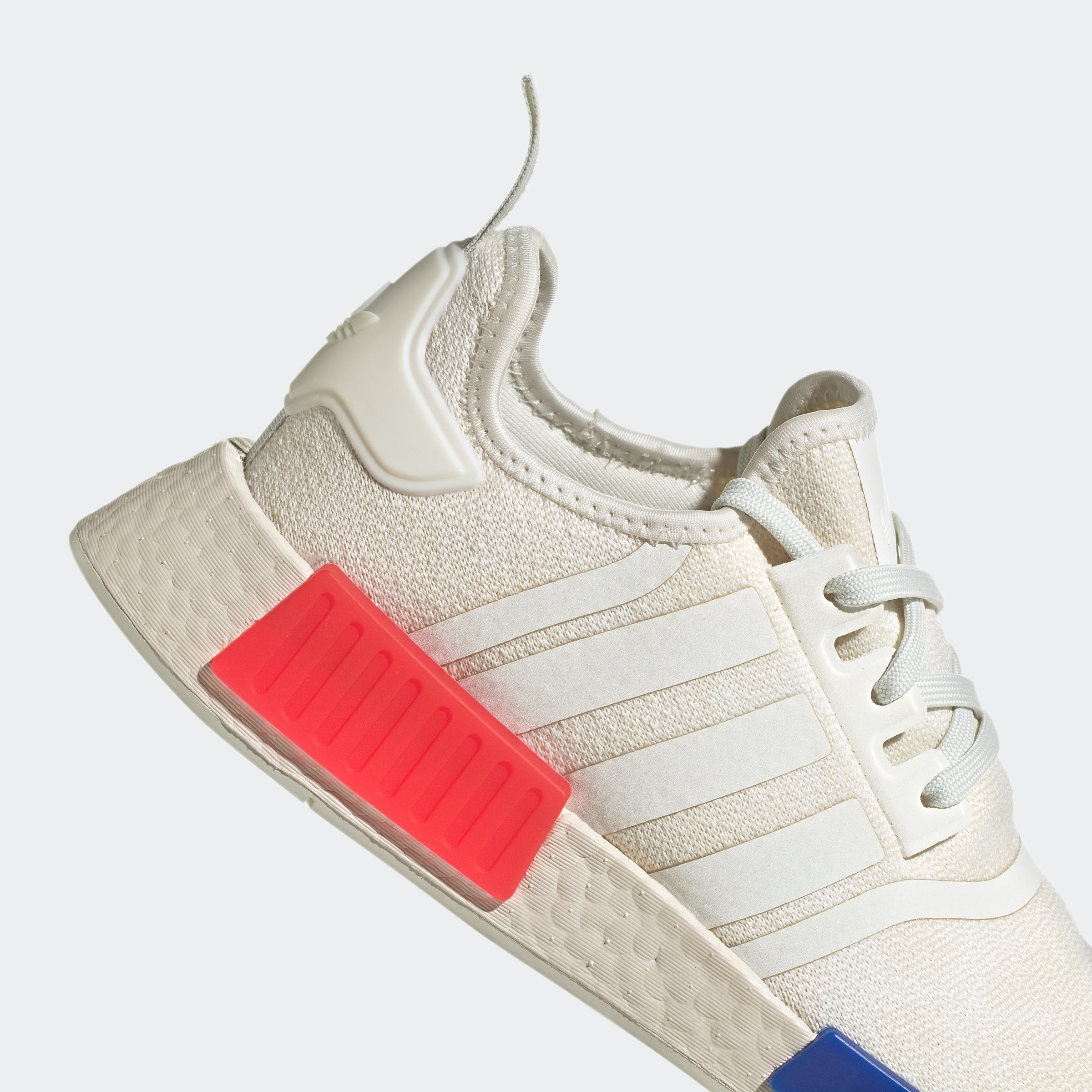 Nmd white blue hot sale and red